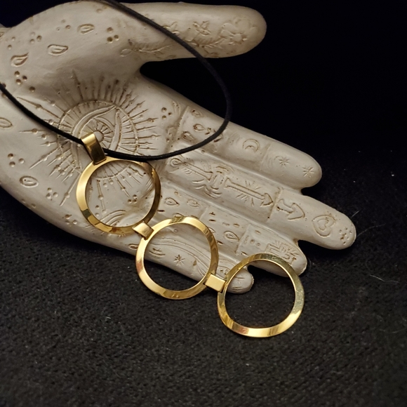 Simple metal pendant on leather cord - Picture 2 of 2